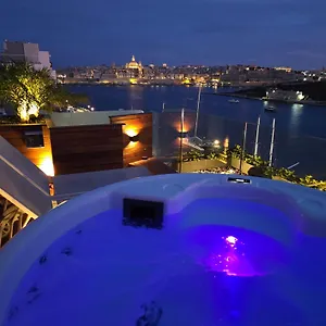 Unique Seafront Triplex Penthouse With Panoramic Bedroom & Rooftop Jacuzzi Overlooking Valletta Sliema
